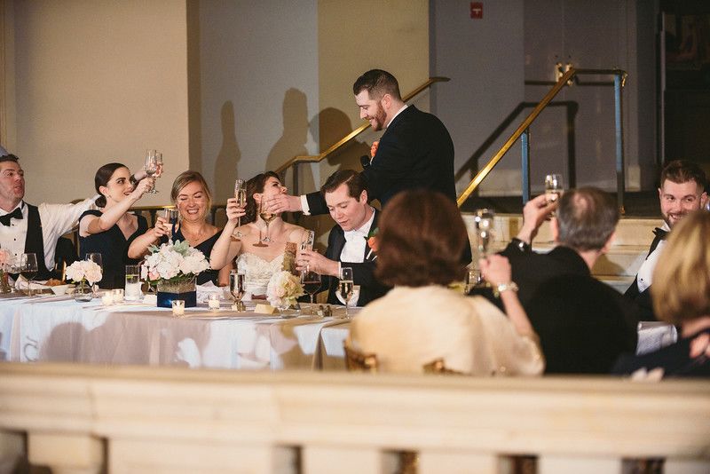 Toasts and Cheers during a wedding reception at NMWA in DC