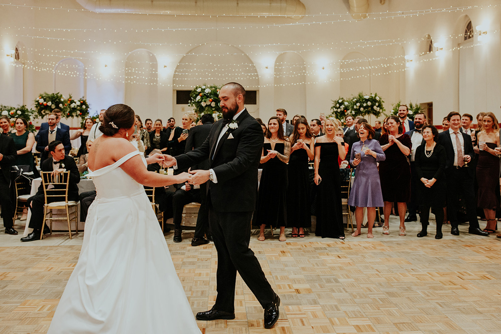 The couple's first dance to Frank Sinatra for their magical winter wedding