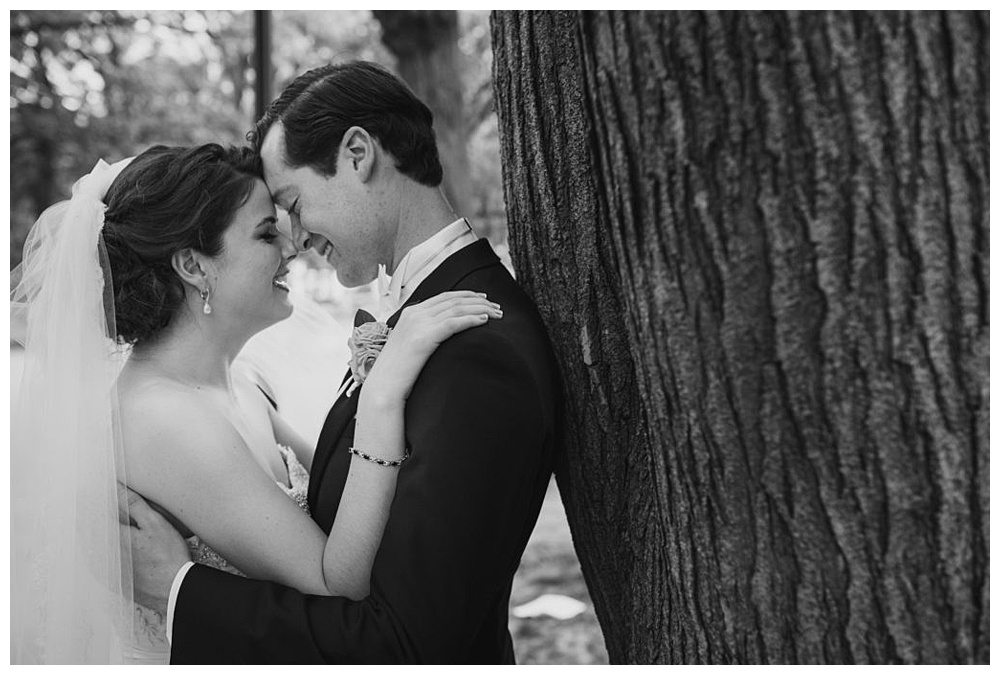 A moment between newlyweds on their Memorial Day weekend wedding